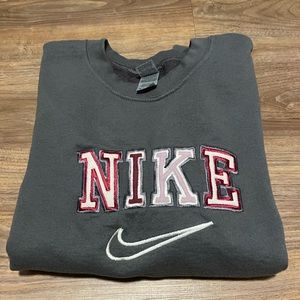 Grey Nike sweatshirt